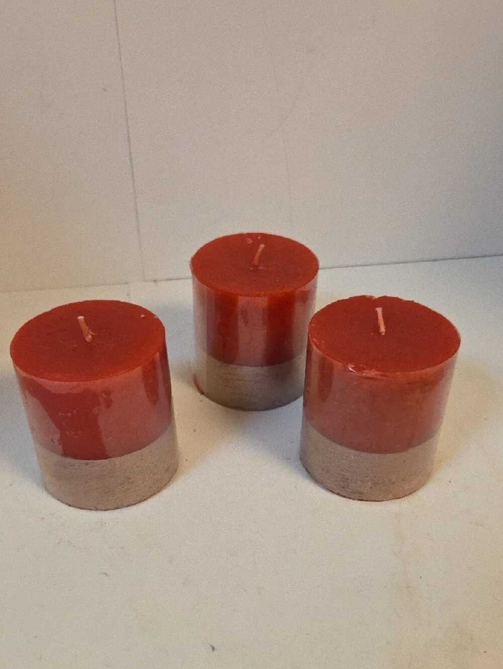 Two-Tone Red and Tan Pillar Candle Trio